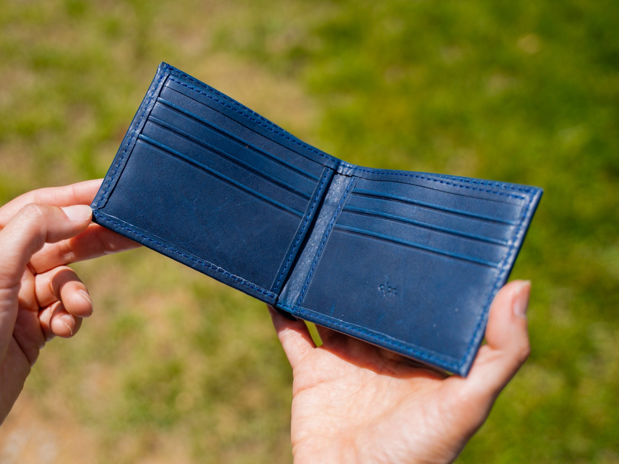 Albinia | Men's bi-fold wallet in calf leather color blue – Il Bisonte