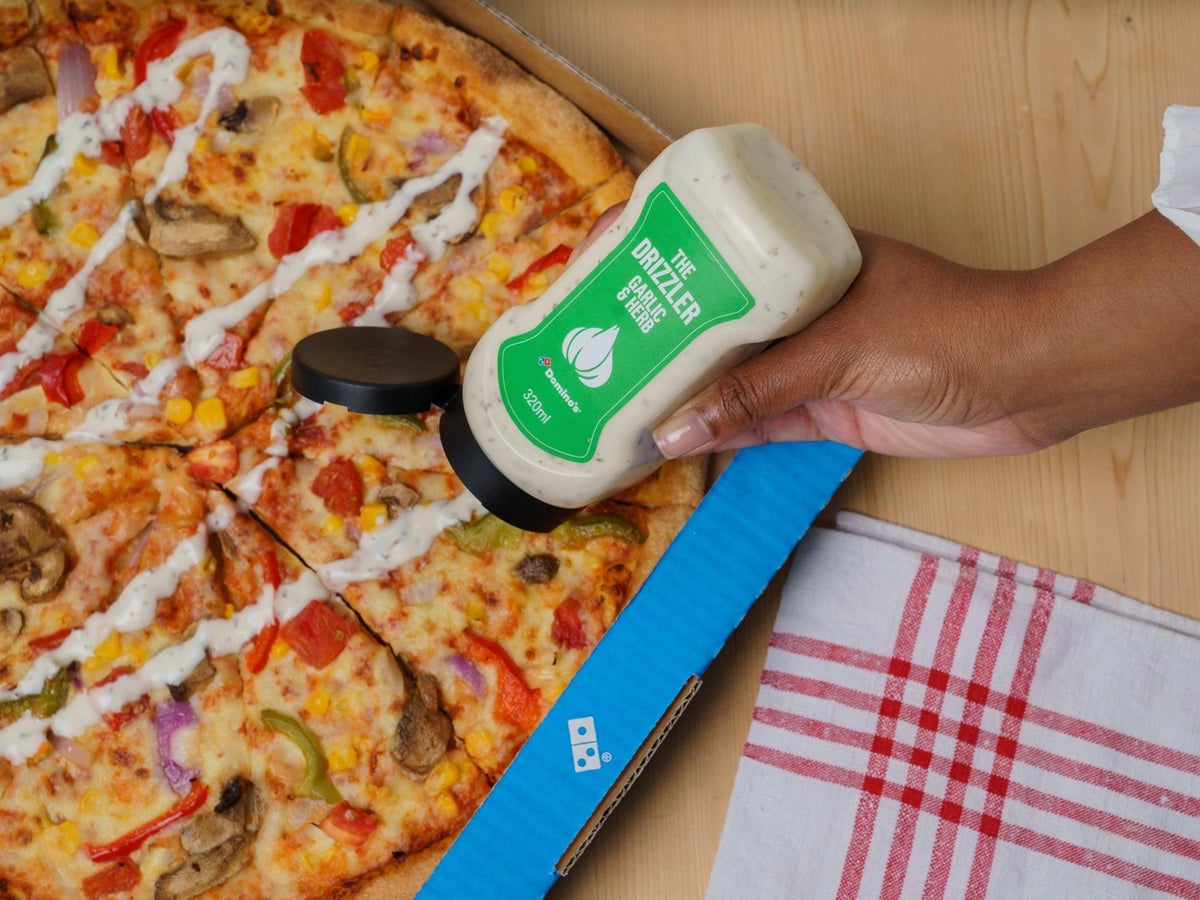 You can now get squeezy bottles of Domino's garlic and herb dip | GoodtoKnow