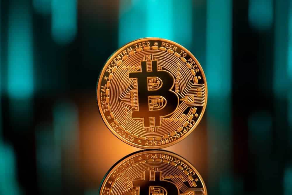 Instant view: Bitcoin rises to record high | Reuters